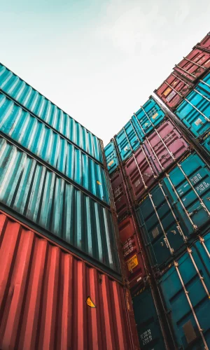 cargo-container-overseas-shipping-high-stack-look-up-from-ground